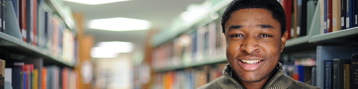 smiling student in library