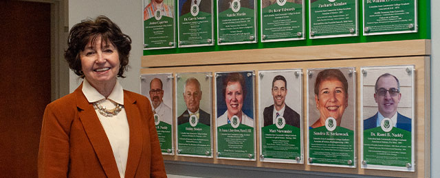Dr. Smith by Alumni Success Wall