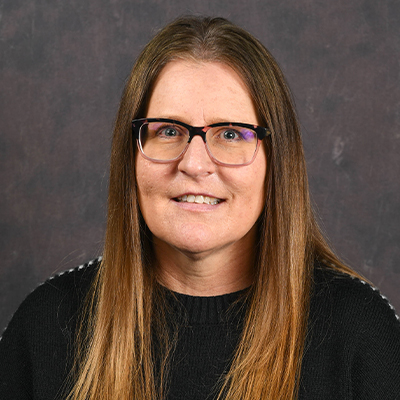 Profile photo of Crystal Creekmore, an Associate Director Admissions and Recruitment, in front of a professional backdrop
