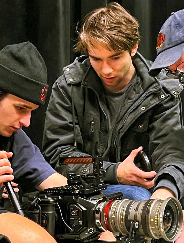 Student cinematographer Dean Fadley(left) and student director Liam Mullen(right) on the set of “The Neighborhood Milkman.”