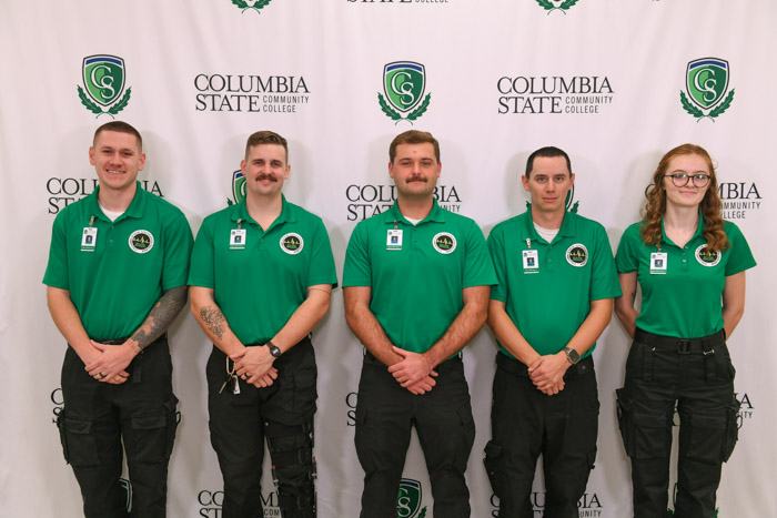 Pictured (standing, left to right): Maury County emergency medical technician graduates Samuel C. Fisher, Seth D. Neal, Jackson D. Scharsch, Michael Garcia and Isadora R. Appling.