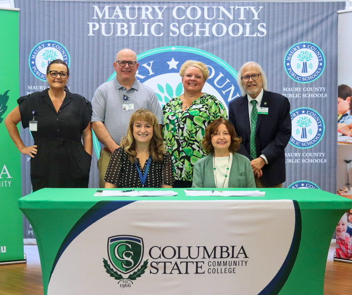Pictured standing (left to right): Shannon Barnes, Maury County Public Schools recruitment and retention specialist; Keith Stacey, Maury County Public Schools assistant superintendent of instruction; Kirstin Senske, Columbia State program director and associate professor of education; and Dr. Barry Gidcomb, Columbia State dean of the Humanities and Social Sciences Division and professor of history. Pictured sitting (left to right): Lisa Ventura, Maury County Public Schools superintendent and Dr. Janet F. Smith, Columbia State president. 