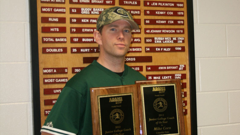 Mike Corn with plaques