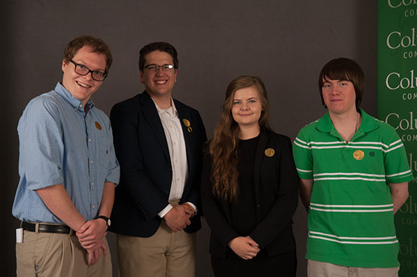 Four students pose for student honors